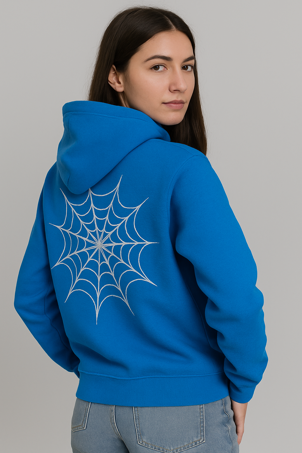 Blue oversized hoodie for women with a white spiderweb graphic on the back.